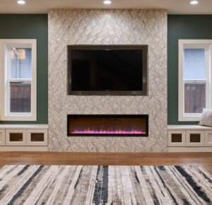 Fireplace with marble and brass mosaic tiles and built-in cabinets