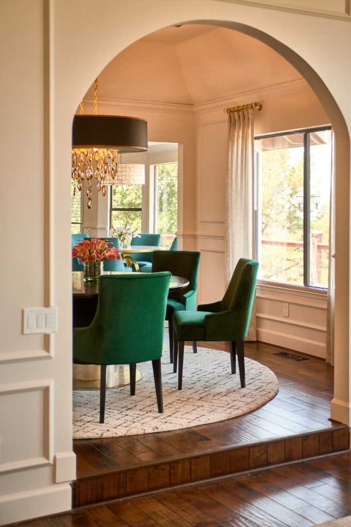 raashi-design-walnut-creek-custom-window-treatments-elegant-dining-room-with-arched-door-way