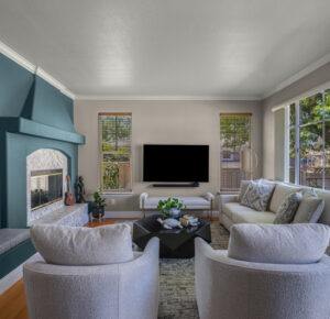 full-service-interior-design-danville-ca-multi-generational-home-design-living-room-with-teal-built-in-shelves-curved-upholstered-chairs-luxury