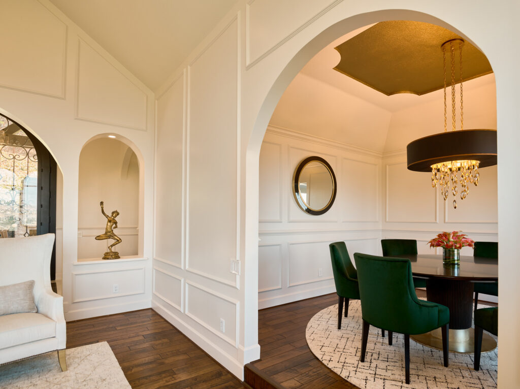 raashi-design-livermore-ca-repetition-with-motifs-in-design-luxury-home-with-arched-openings-round-dining-table-upholstered-chairs-personalized-virtaul-design