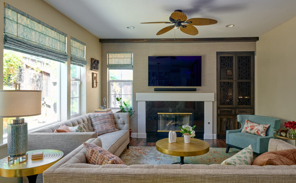 raashi-design-woodside-ca-renovate-or-build-custom-home-living-room-large-window-comfortable-furnishings-ceiling-fan-transitional