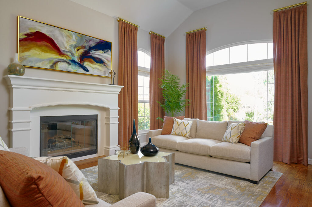 raashi-design-alamo-ca-interior-design-trade-relationships-living-room-burnt-orange-drapes-cream-custom-sofa-contemporary-virtual-interior-design
