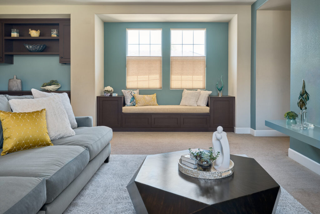raashi-design-pleasanton-ca-interior-design-wood-accents-living-room-built-in-window-seat-geometric-coffee-table-modern-designer-on-call