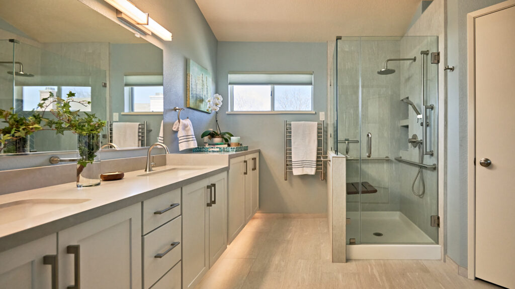 full-service-interior-design-berkeley-ca-factors-in-interior-design-investment-bathroom-with-glass-shower-double-vanity-large-mirror-light-colors
